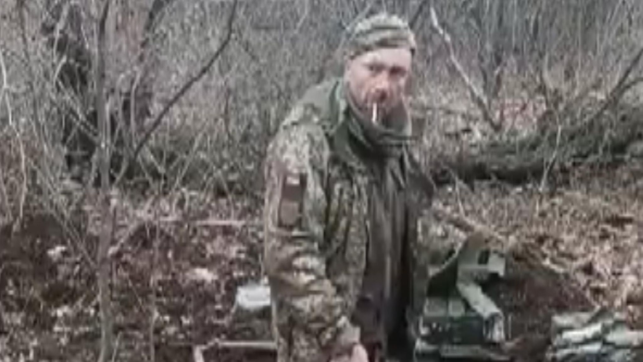 A video purports to show the killing of an unarmed Ukrainian soldier.