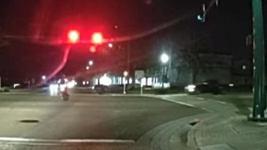 Video shows biker running through red light and crashing into truck ...
