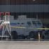 Plane hit by bullets and two killed in failed $32m airport heist