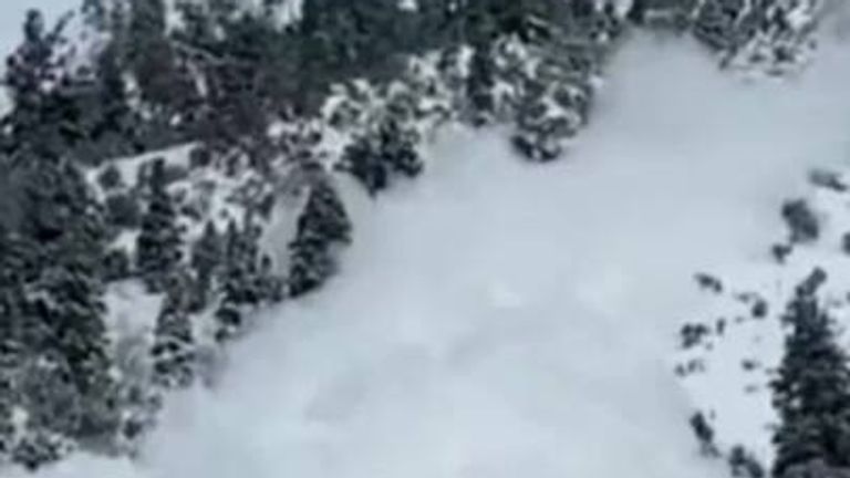Snow plummets down mountainside in Utah