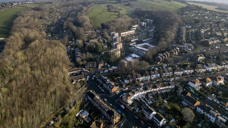 The Roedale Valley Allotments (top left) and the cordoned off area of police activity today at the woodland and allotments (centre right) in Brighton
