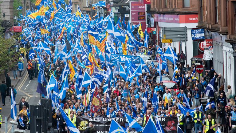 Scottish independence supporters march through Glasgow during the All Under One Banner march.