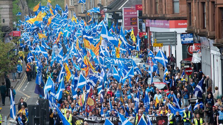 Scottish independence supporters march through Glasgow during the All Under One Banner march.