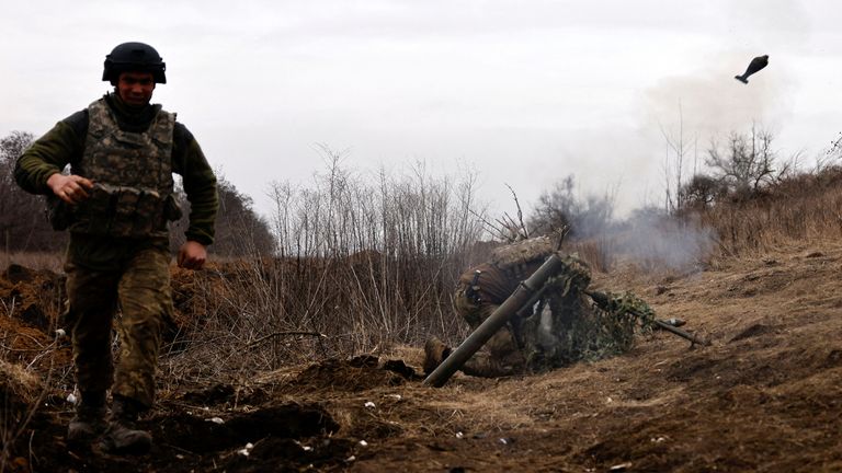 Ukrainian soldiers of the Paratroopers&#39; of 80th brigade fire a mortar shell at a frontline position near Bakhmut, amid Russia&#39;s attack on Ukraine, in Donetsk region, Ukraine March 16, 2023. REUTERS/Violeta Santos Moura TPX IMAGES OF THE DAY