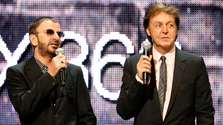 Ringo Starr (L) and Paul McCartney, of The Beatles introduce the new video game "The Beatles Rockband" at the Microsoft XBox 360 E3 2009 media briefing in Los Angeles June 1, 2009. REUTERS/Fred Prouser (UNITED STATES ENTERTAINMENT)