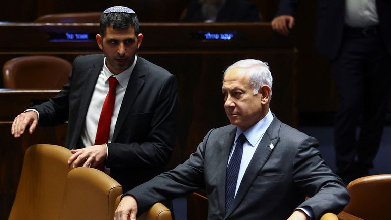 Benjamin Netanyahu (right) attends a meeting at the Knesset on Monday