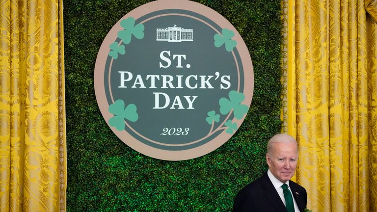 President Joe Biden listens to Irish Taoiseach Leo Varadkar speak during a St. Patrick's Day reception in the East Room of the White House, Friday, March 17, 2023, in Washington.  (AP Photo/Alex Brandon)