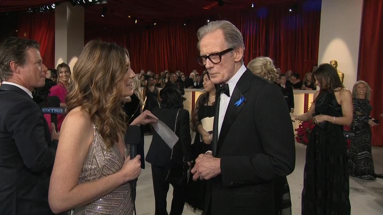 Actor Bill Nighy speaks about wearing a blue ribbon at the Oscars