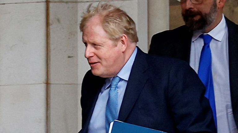 Former British Prime Minister Boris Johnson walks at the parliament in London, Britain, March 22, 2023. REUTERS/Peter Nicholls