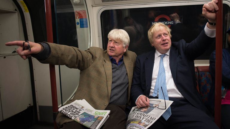 Boris Johnson sits next to his father Stanley (left) on the Bakerloo Line as he bumped into him by chance on the tube train as it left Marylebone Station in London.