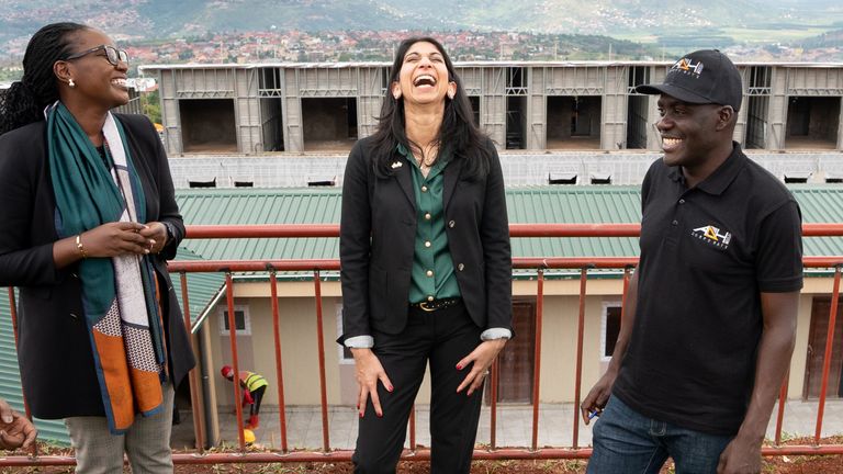Suella Braverman laughs during her visit to Kigali, Rwanda