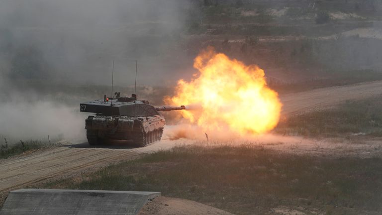 British Army Challenger tank of the NATO enhanced Forward Presence battle group based in Estonia, fires during certification field tactical exercise in Adazi, Latvia June 18, 2020. REUTERS/Ints Kalnins
