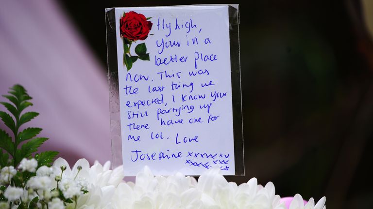 A message left with floral tributes left near the scene in the St Mellons area of Cardiff where three people who disappeared on a night out have died in a road traffic accident. Two others who had also been reported missing have been transported to hospital with serious injuries. Sophie Russon, 20, Eve Smith, 21, and Darcy Ross, 21, who had made the trip from Porthcawl, and Rafel Jeanne, 24, and Shane Loughlin, 32, both from Cardiff, had last been seen in the city in the early hours of Saturday.