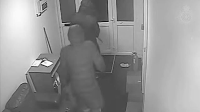 CCTV footage of Affia and Brown leaving Mr Murray&#39;s flat carrying a knife. Pic: Bedfordshire Police