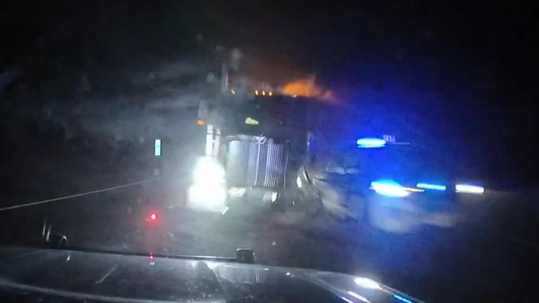 New Jersey Department of Transport (NJDOT) released dashcam footage of a lorry crashing into three New Jersey State Police cars at high speed on Interstate 80.
