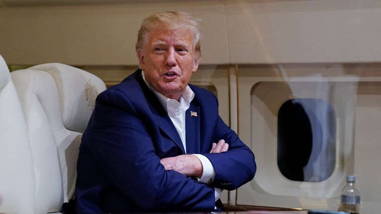 Donald Trump pictured on his plane. Image: AP