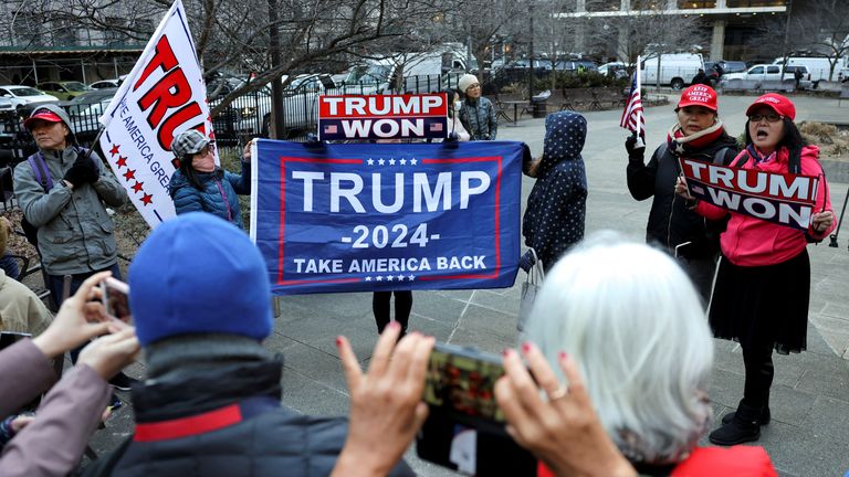 Donald Trump supporters protest outside New York courthouse as DA Alvin Bragg continues investigation