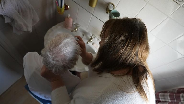 Dorothy Cook makes Melvin&#39;s meals; prepares and gives him his medication; supports him as he walks slowly with a frame and washes him and assists him in the bathroom.