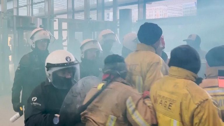 Belgian firefighters storm EU building in protest