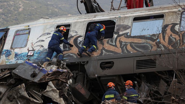 Rescuers operate at the site of a crash, where two trains collided, near the city of Larissa, Greece, March 1, 2023. REUTERS/Alexandros Avramidis
