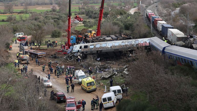 Rescuers operate at the site of a crash, where two trains collided, near the city of Larissa, Greece, March 1, 2023. REUTERS/Alexandros Avramidis