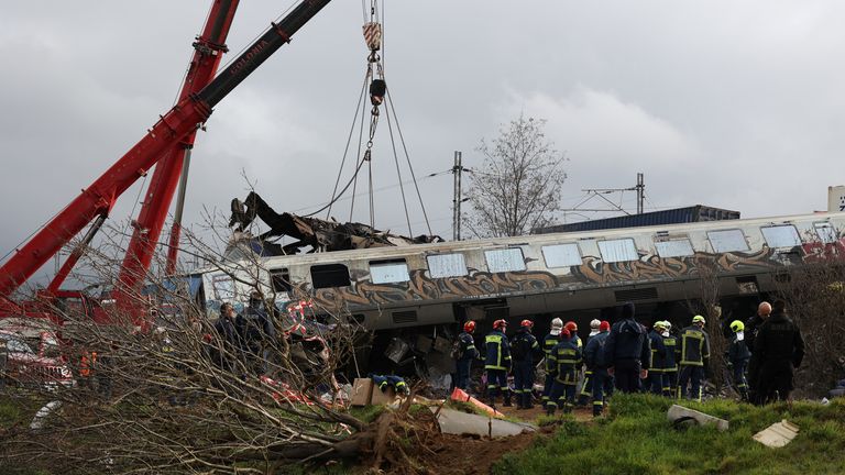 Rescuers operate at the site of a crash, where two trains collided, near the city of Larissa, Greece, March 1, 2023. REUTERS/Alexandros Avramidis