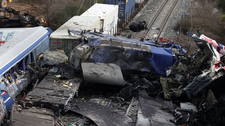 Destroyed train carriages are seen at the site of a crash, where two trains collided, near the city of Larissa, Greece, March 1, 2023. REUTERS/Alexandros Avramidis