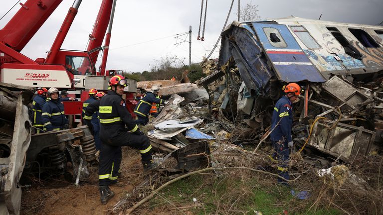 Rescuers operate at the site of a crash, where two trains collided, near the city of Larissa, Greece, March 1, 2023. REUTERS/Alexandros Avramidis