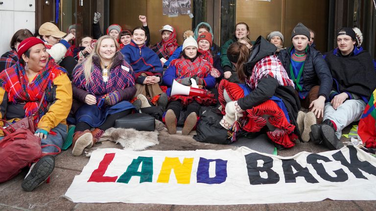 Campaigners block the entrance to the Department of Oil and Energy with Greta Thunberg.  Photo: NTB/Ole Berg-Rusten via Reuters