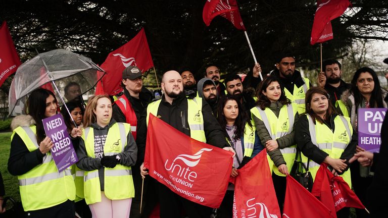 Security guard members of the Unite union on the picket line at Heathrow Airport, London, after last-ditch talks failed to resolve a pay dispute with action likely to disrupt school holiday travel. The guards are beginning ten days of planned continuous strike action across the Heathrow campus ending in the early hours of Easter Monday. Picture date: Friday March 31, 2023.
