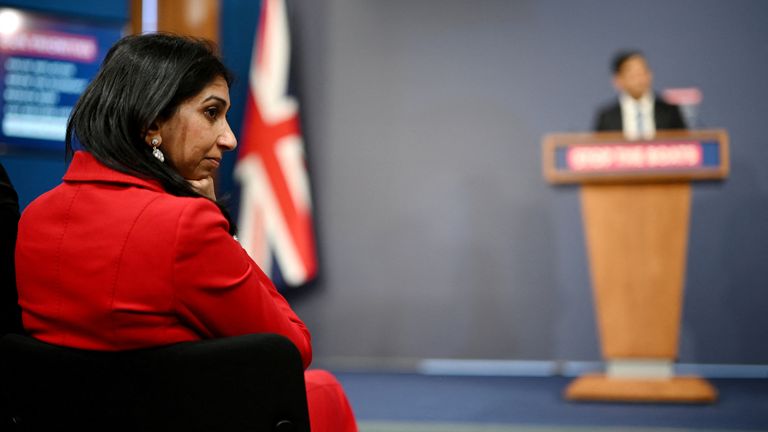 Home Secretary Suella Braverman listens to Rishi Sunak