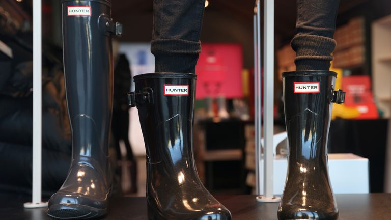 Hunter boots are seen at their store at the Woodbury Common Premium Outlets in Central Valley, New York, U.S., February 15, 2022. REUTERS/Andrew Kelly