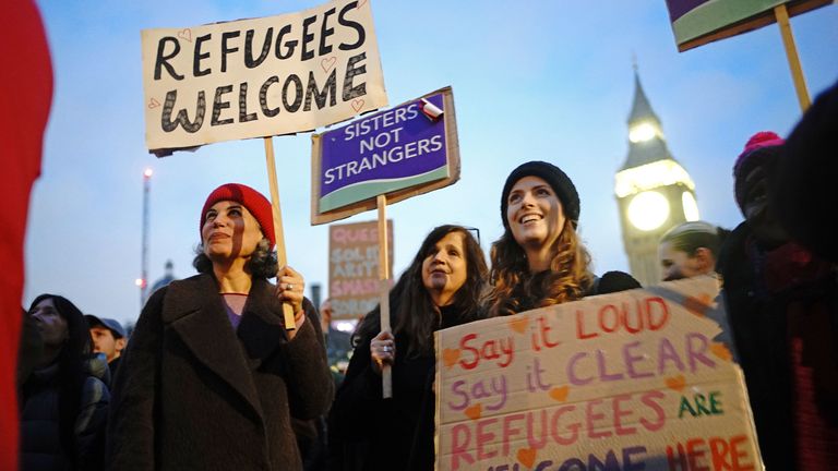Demonstrators protesting against the Illegal Migration Bill in Parliament Square, London