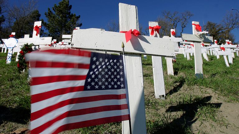 FILE PHOTO: Thousands of crosses stand on a hillside memorial in honor of U.S. troops killed in the Iraq war, in Lafayette, California, January 12, 2007. REUTERS/Kimberly White (UNITED STATES)/File Photo