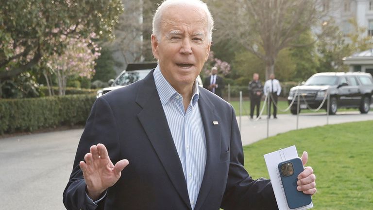 Members of the media ask questions to U.S. President Joe Biden as he walks to the Marine One helicopter to depart for travel to Mississippi to view tornado damage, from the White House in Washington, U.S., March 31, 2023. REUTERS/Jonathan Ernst
