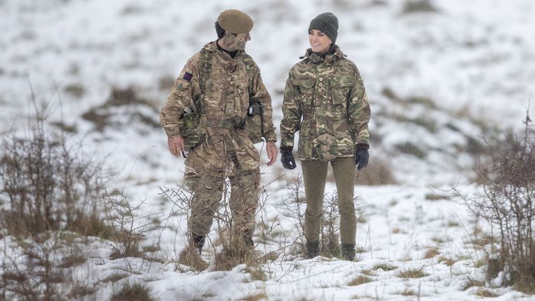 The Princess of Wales, Colonel of the Irish Guards, is shown how to carry out battlefield casualty drills to deliver care to injured soldiers during a casualty simulation exercise, during her first visit to the 1st Battalion Irish Guards since becoming Colonel, at the Salisbury Plain Training Area in Wiltshire. Picture date: Wednesday March 8, 2023.