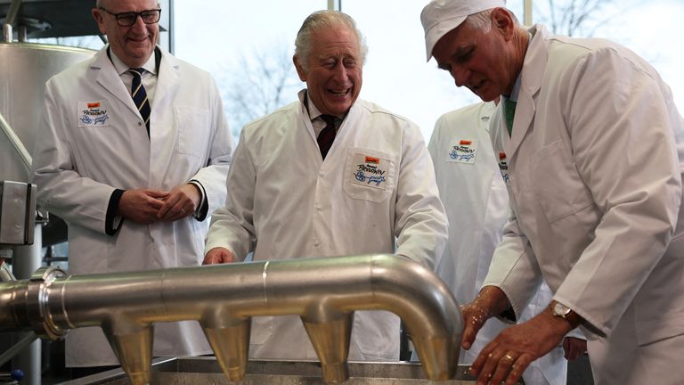King Charles III, Brandenburg state premier Dietmar Woidke, and German President Frank-Walter Steinmeier visit a cheese dairy in the eco-village of Brodowin on during the royal tour of Germany