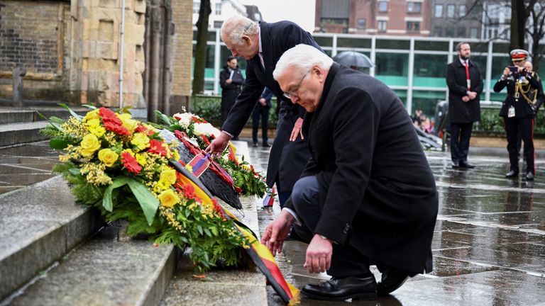 King Charles and German President Frank-Walter Steinmeier lay wreaths at St. Nikolai church memorial dedicated to the victims of allied bombings during World War Two in Hamburg, Germany, March 31, 2023. REUTERS/Annegret Hilse

