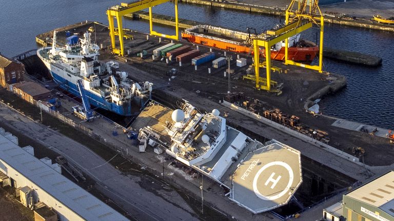 A view of the ship Petrel at Imperial Dock in Leith, Edinburgh, which has become dislodged from its holding and is partially toppled over. Fifteen people were taken to hospital while a further 10 patients were treated and discharged at the scene after emergency services were called at around 8.35am on Wednesday morning. Picture date: Thursday March 23, 2023.