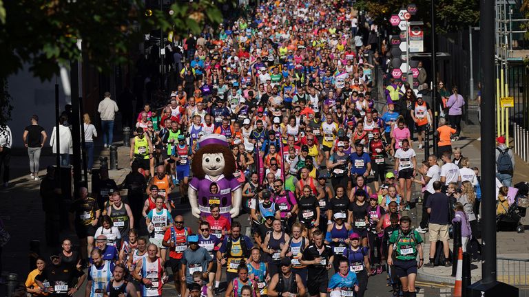 Runners reach the Isle of Dogs during the London Marathon