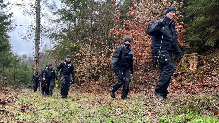 The police search the woods