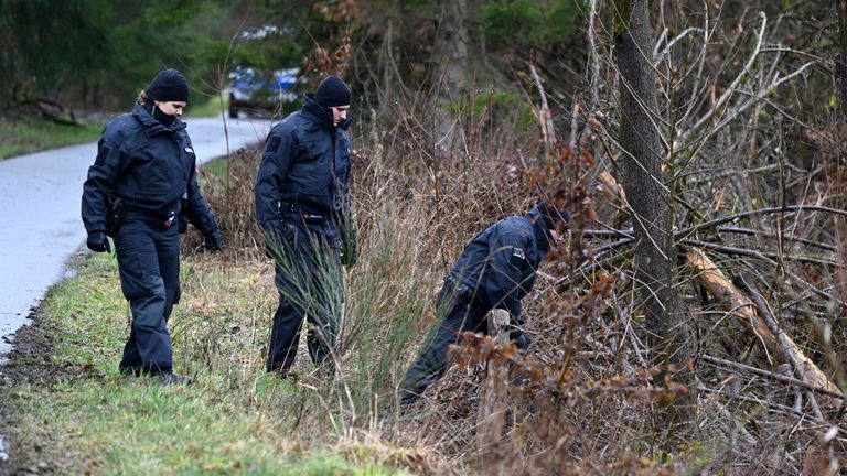 Police search for more clues over the killing. Pic: AP