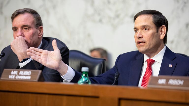 (LR) Chairman Mark Warner listens to Vice President Marco Rubio speak during a Senate Intelligence Committee hearing.  Photo: AP