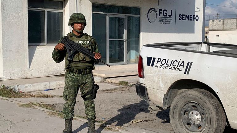 A Mexican army soldier guards the Tamaulipas State Prosecutor&#39;s headquarters in Matamoros. Pic: AP