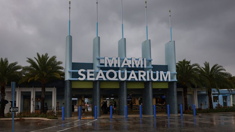 The entrance to Miami Seaquarium is seen, Thursday, March 30, 2023, in Miami. An unlikely coalition of a theme park owner, animal rights group and NFL owner-philanthropist announced Thursday that a plan is in place to return Lolita, an orca that has lived at the Miami Seaquarium for more than 50 years, to her home waters in the Pacific Northwest. (Alie Skowronski/Miami Herald via AP)