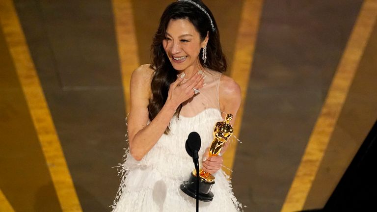Michelle Yeoh accepts the award for best performance by an actress in a leading role for "Everything Everywhere All at Once" at the Oscars on Sunday, March 12, 2023, at the Dolby Theatre in Los Angeles. (AP Photo/Chris Pizzello)