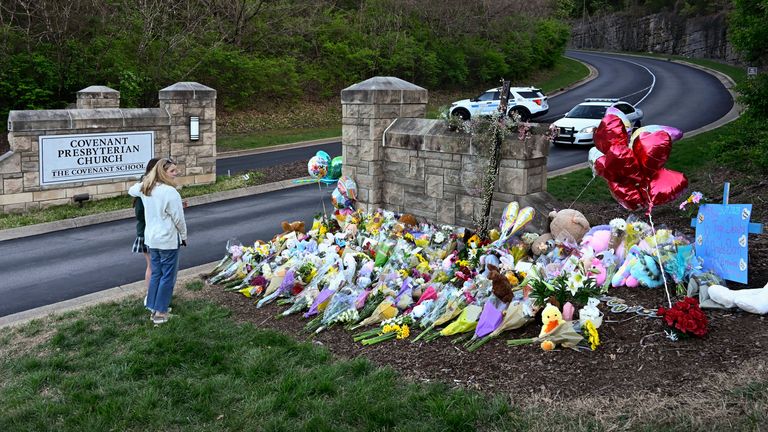 People pay their respects at an entry to The Covenant School Pic: AP