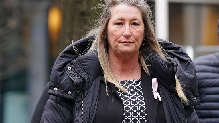 Cheryl Korbel (C), mother of nine-year-old Olivia Pratt-Korbel, arrives with family members at Manchester Crown Court for the trial of Thomas Cashman