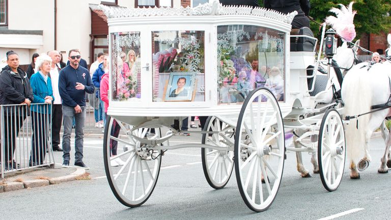 Olivia&#39;s coffin carried by horse-drawn carriage on the day of her funeral. Pic: AP