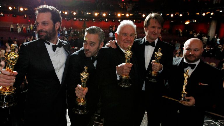 From left, Emile Sherman, Iain Canning, David Seidler, Tom Hooper and Gareth Unwin pose with the award for best picture for "The King&#39;s Speech" at the 83rd Academy Awards on Sunday, Feb. 27, 2011, in the Hollywood section of Los Angeles. (AP Photo/Chris Carlson)


